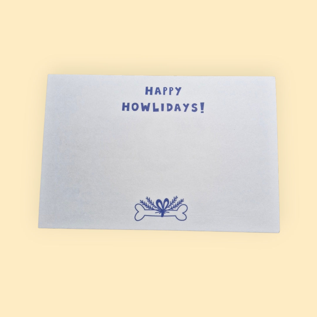 achterkant van het kerstkaartje met de tekst happy howlidays