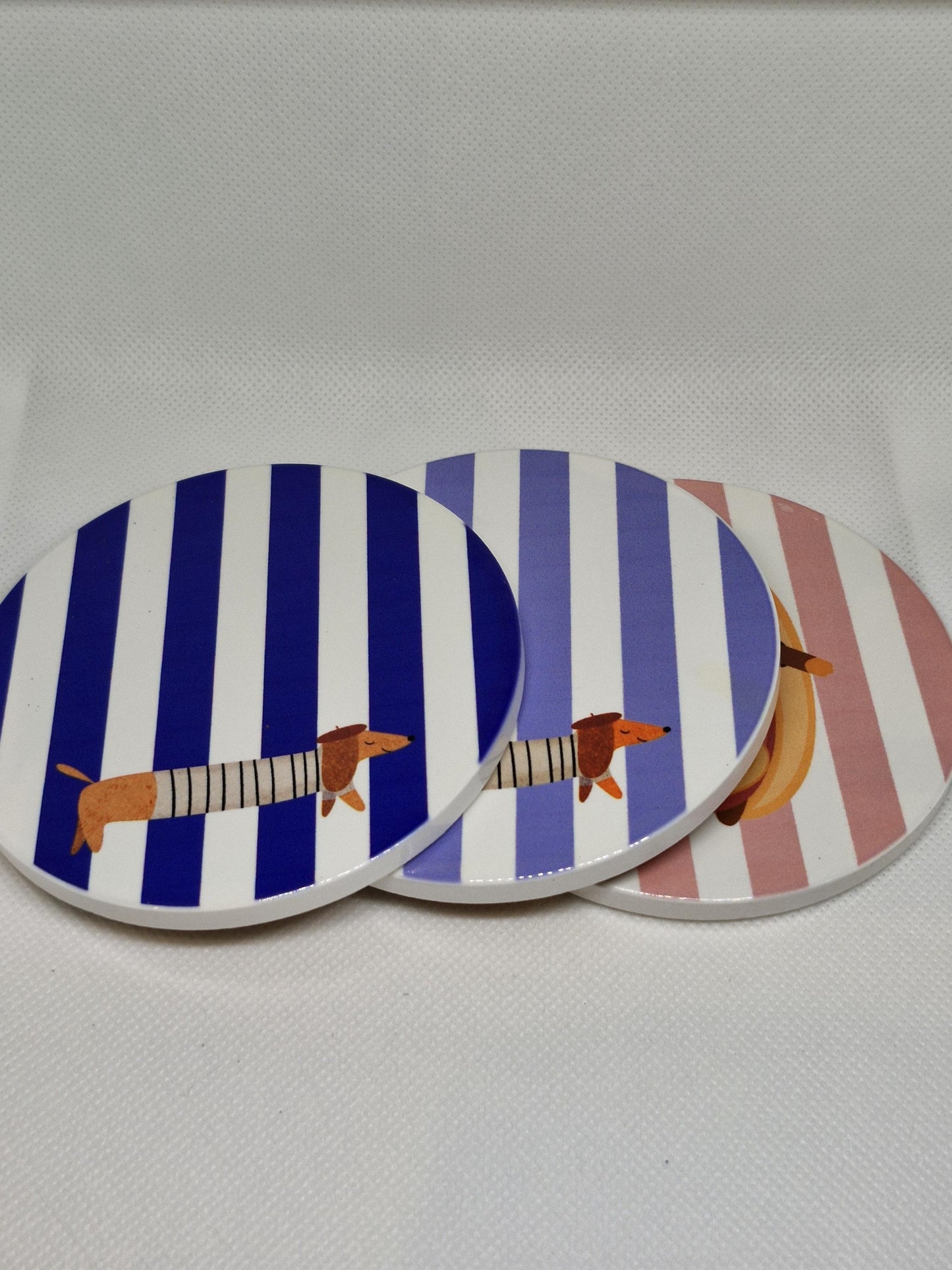 Teckel Onderzetters "La Saucisse Parisienne" - Uniek Design voor Hondenliefhebbers - 2 stuks