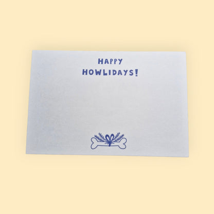 achterkant van de kerstkaart met de tekst happy howlidays