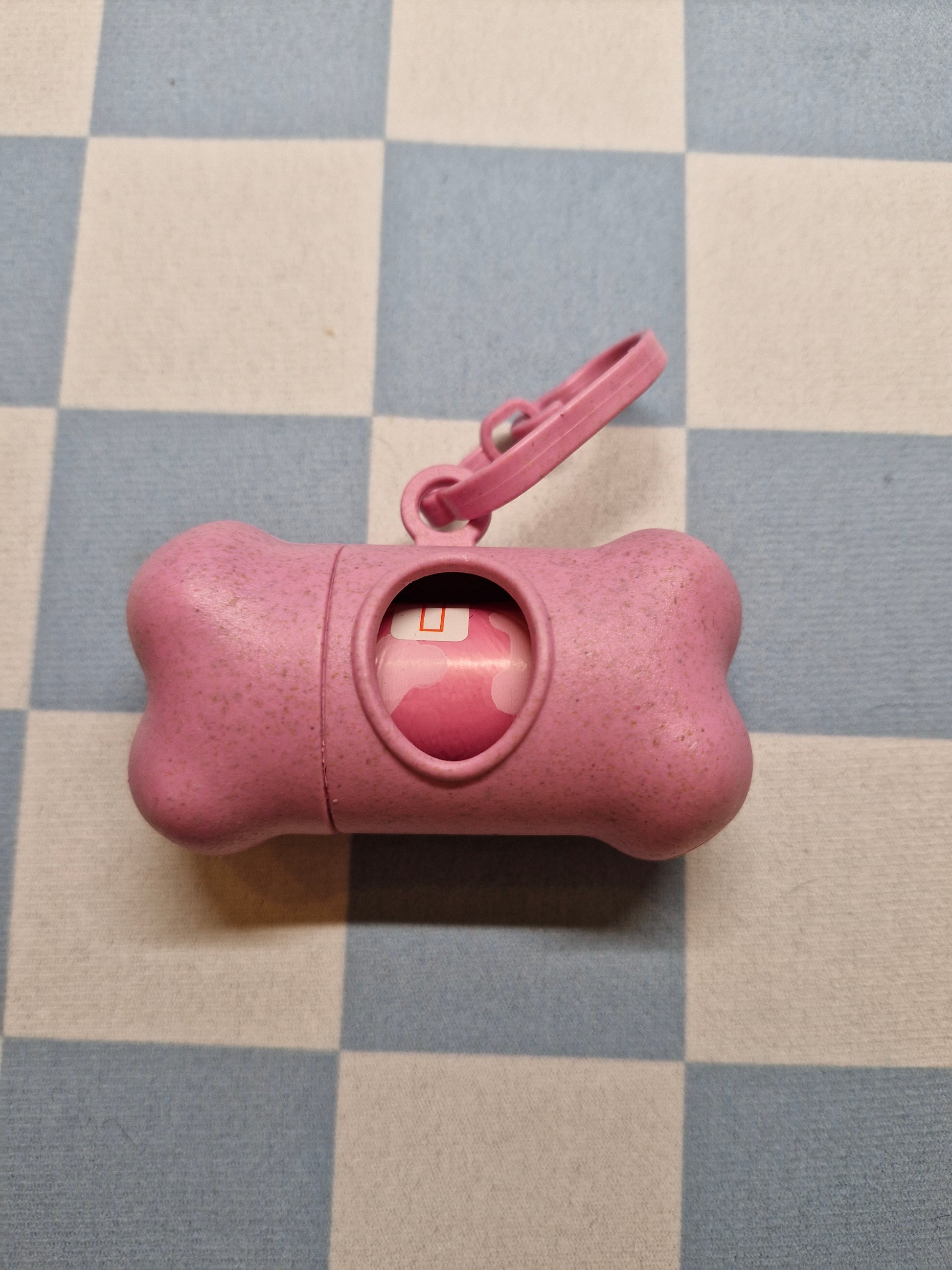 poepzakhouder in de vorm van een beentje - roze