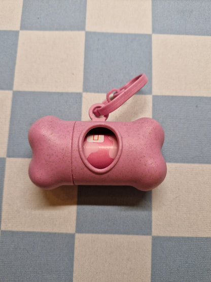 poepzakhouder in de vorm van een beentje - roze
