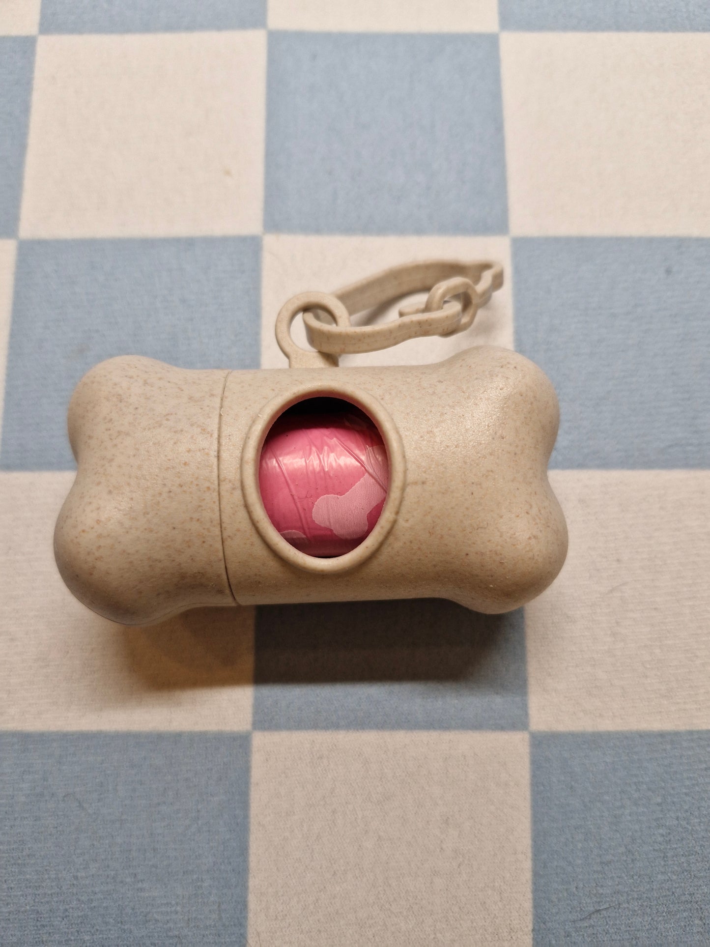 poepzakhouder in de vorm van een beentje - beige
