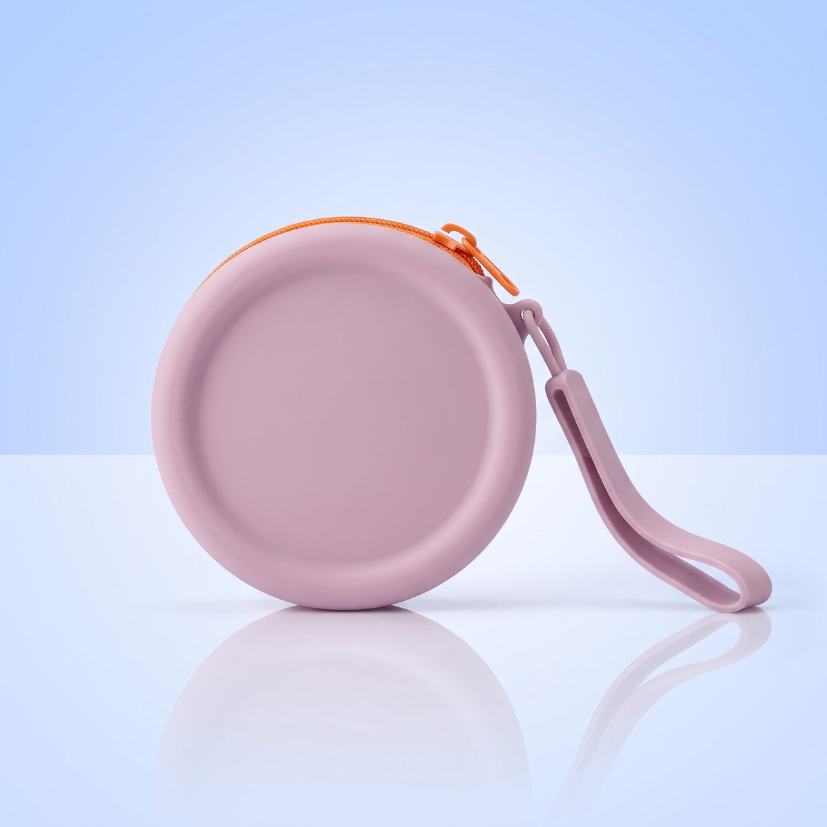 Lila siliconen treat pouch met oranje rits en polslus voor hondensnoepjes
