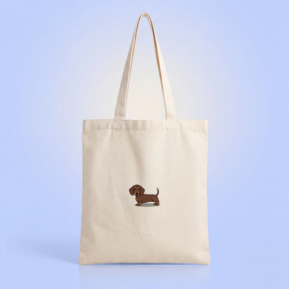 Ecru canvas totebag met kleine bruine teckel op de voorkant voor teckelbaasjes