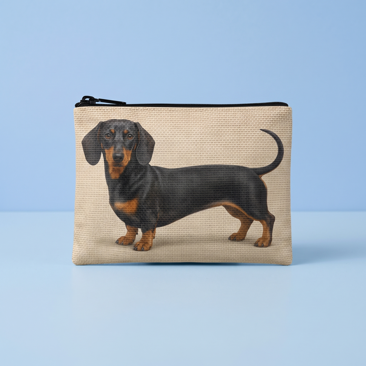 Portemonneetje met rits en print van een black and tan teckel