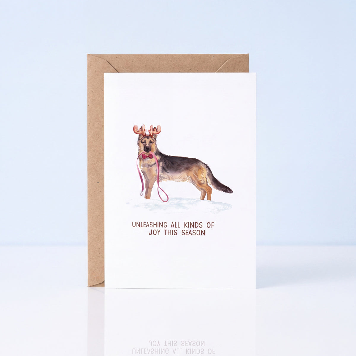 Kerstkaart Duitse herder met gewei Unleashing Joy, A6 dubbel gevouwen