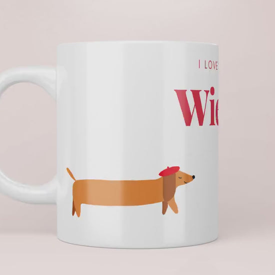 Video Mok met lange teckel met tekst “ I love a good wiener”